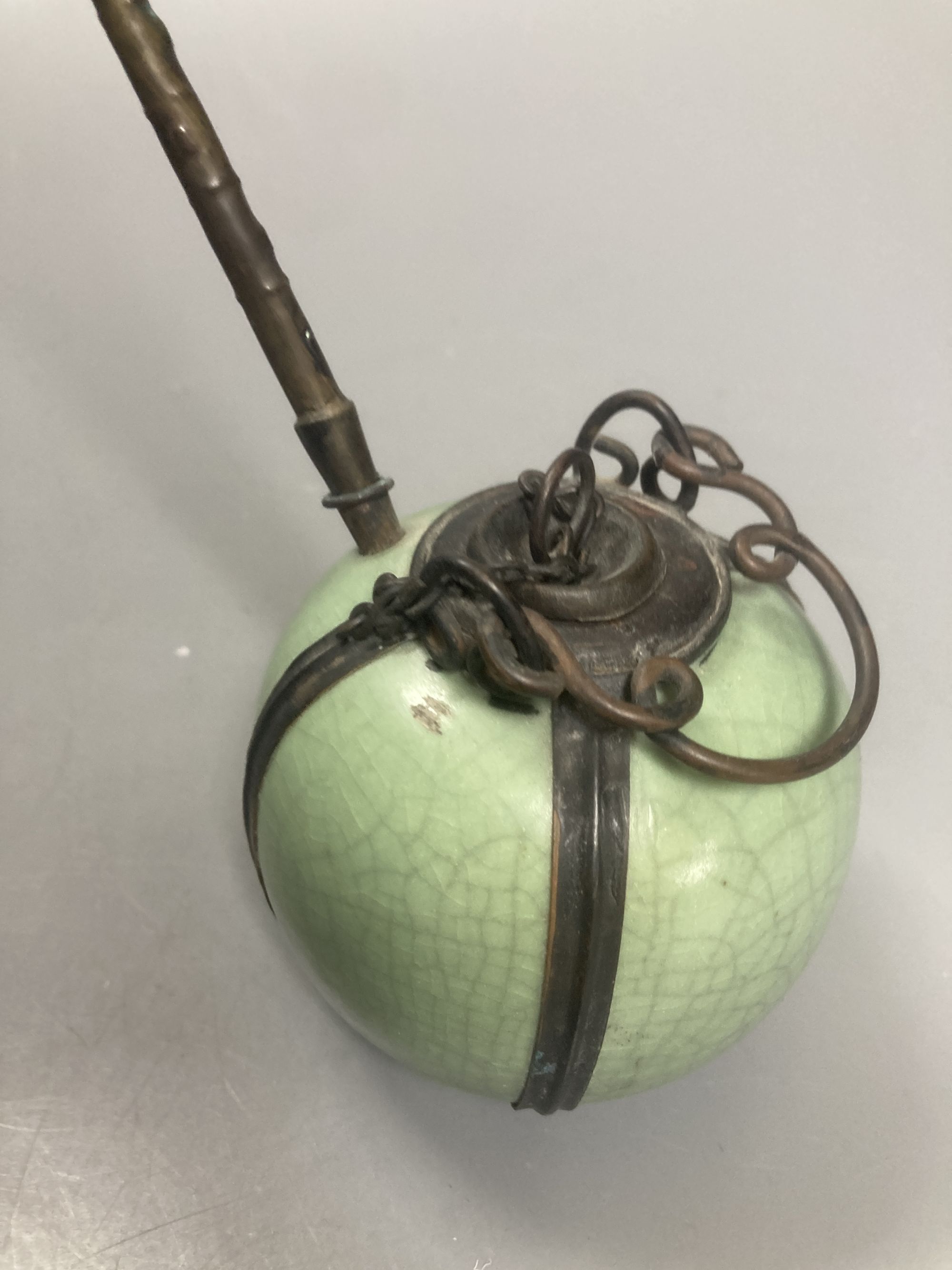 A Chinese celadon glazed water pipe and another 20cm total
